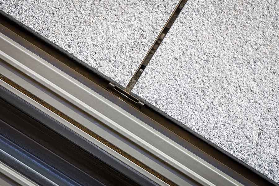 Paving transition and edge spring clip